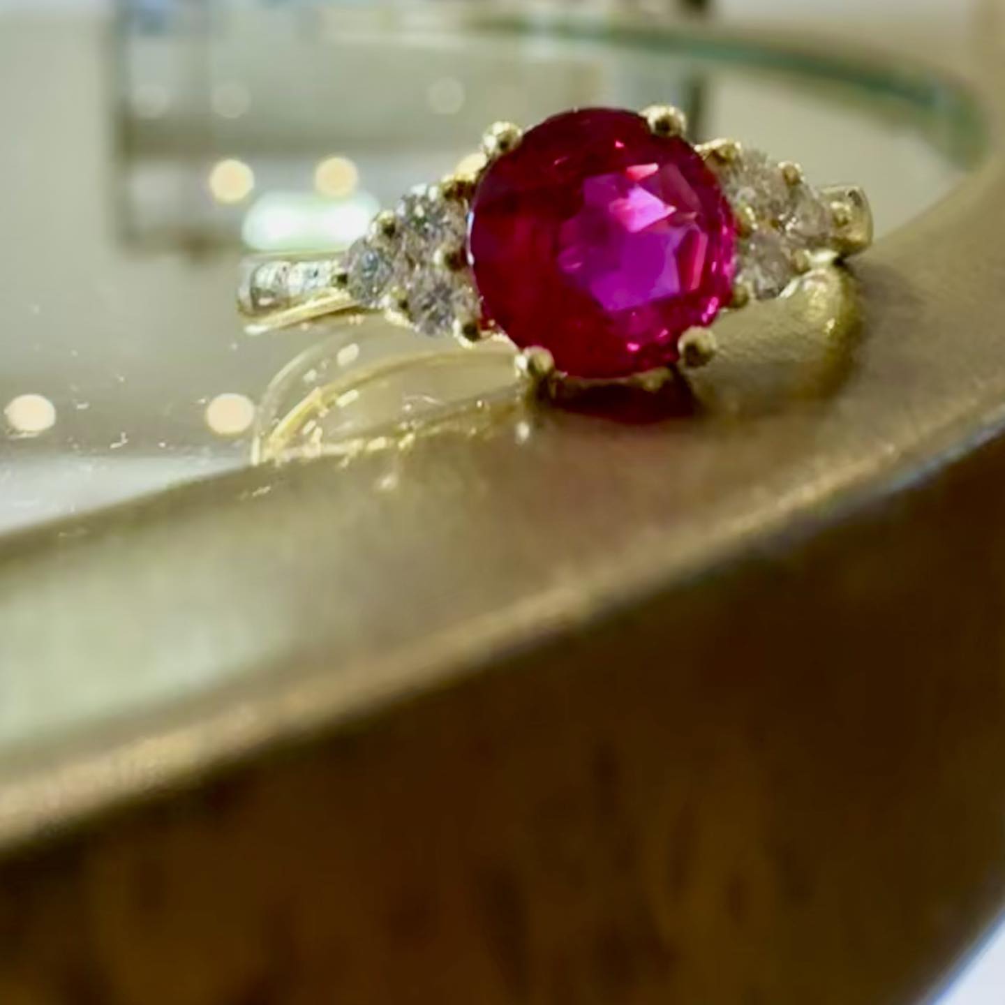 Ruby Ring with Diamond Trio Accents
