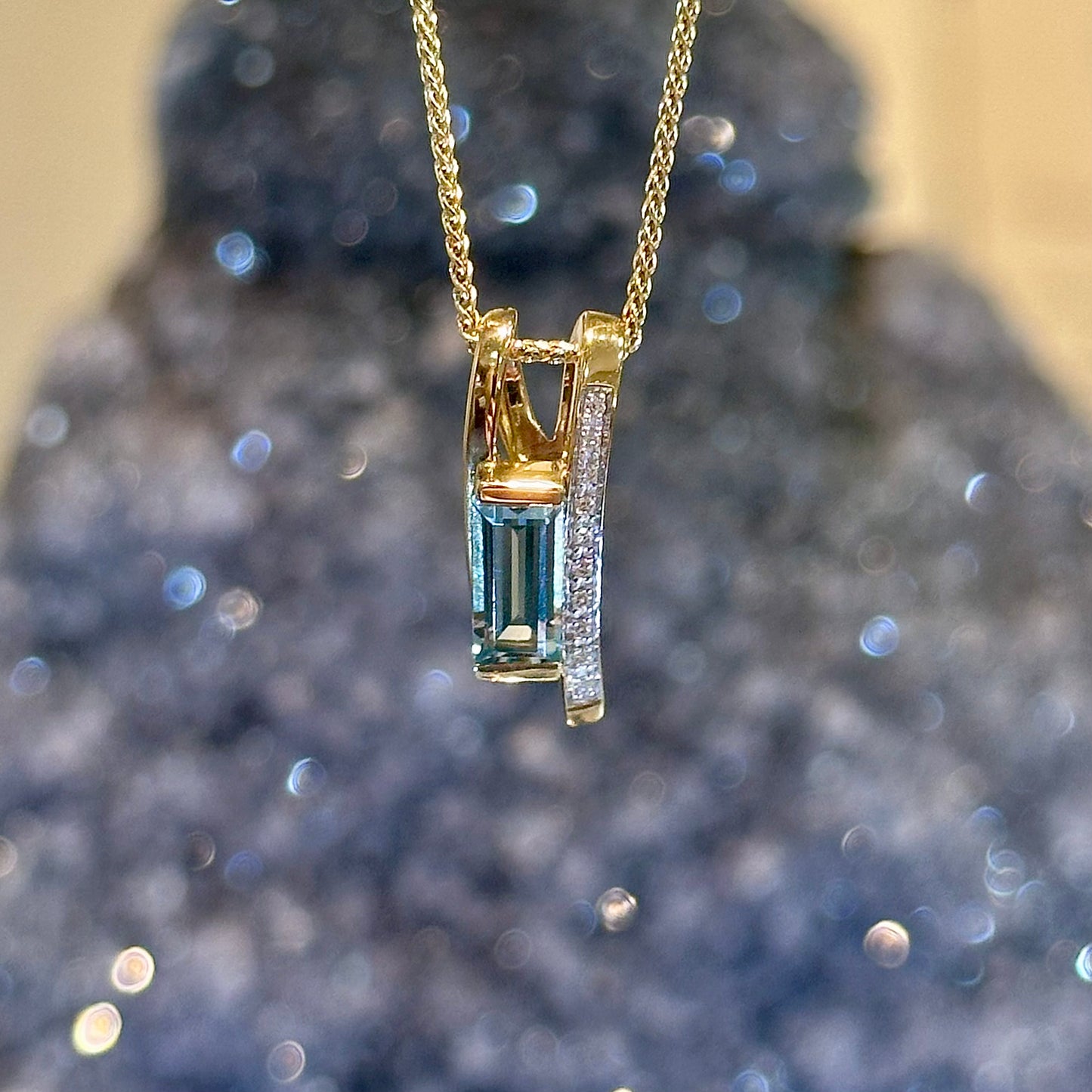 Blue Topaz and Diamond Pendant
