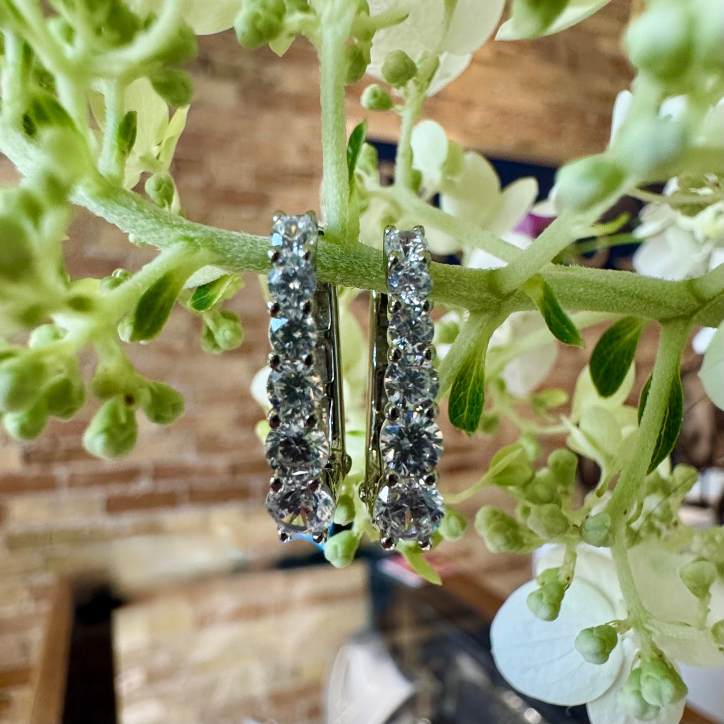 Graduated CZ Oval Huggie Hoop