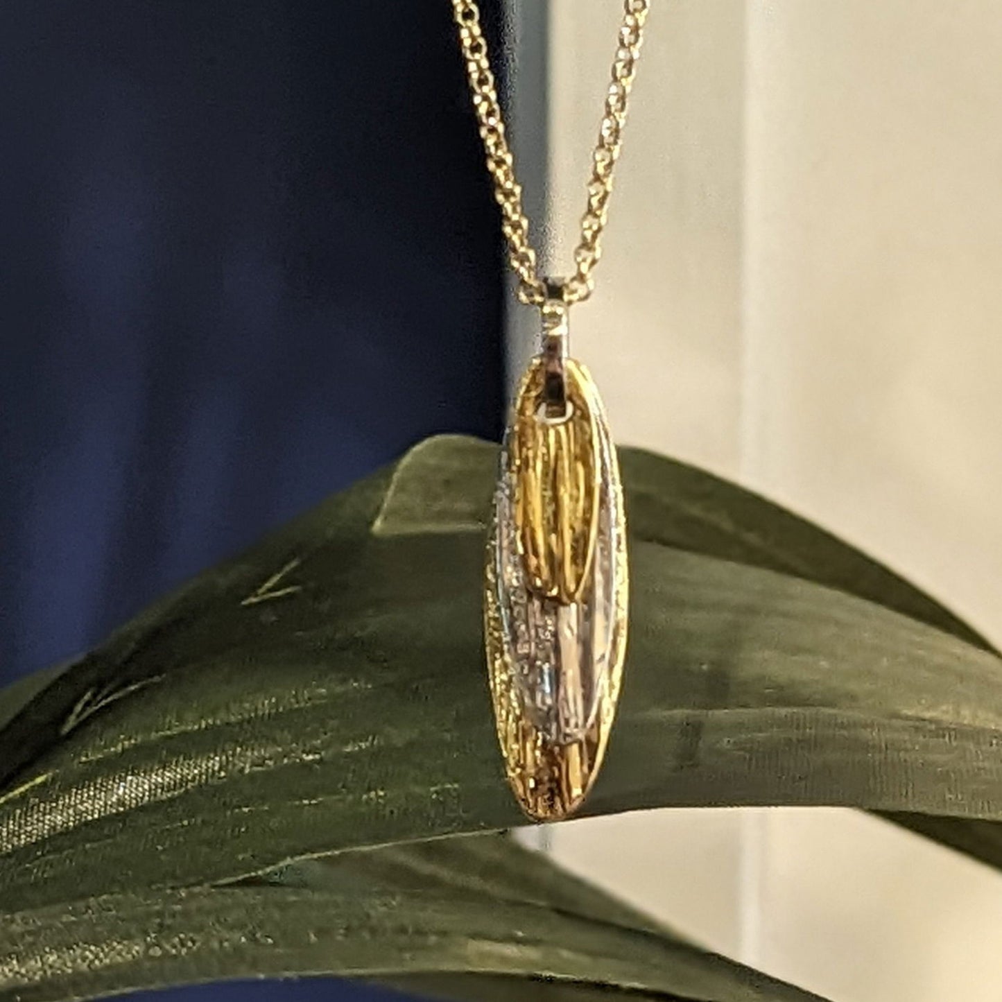 Photo of "Arizona" Pendant in a decorative scene, designed by , available at Plumb Gold & Plumb Silver