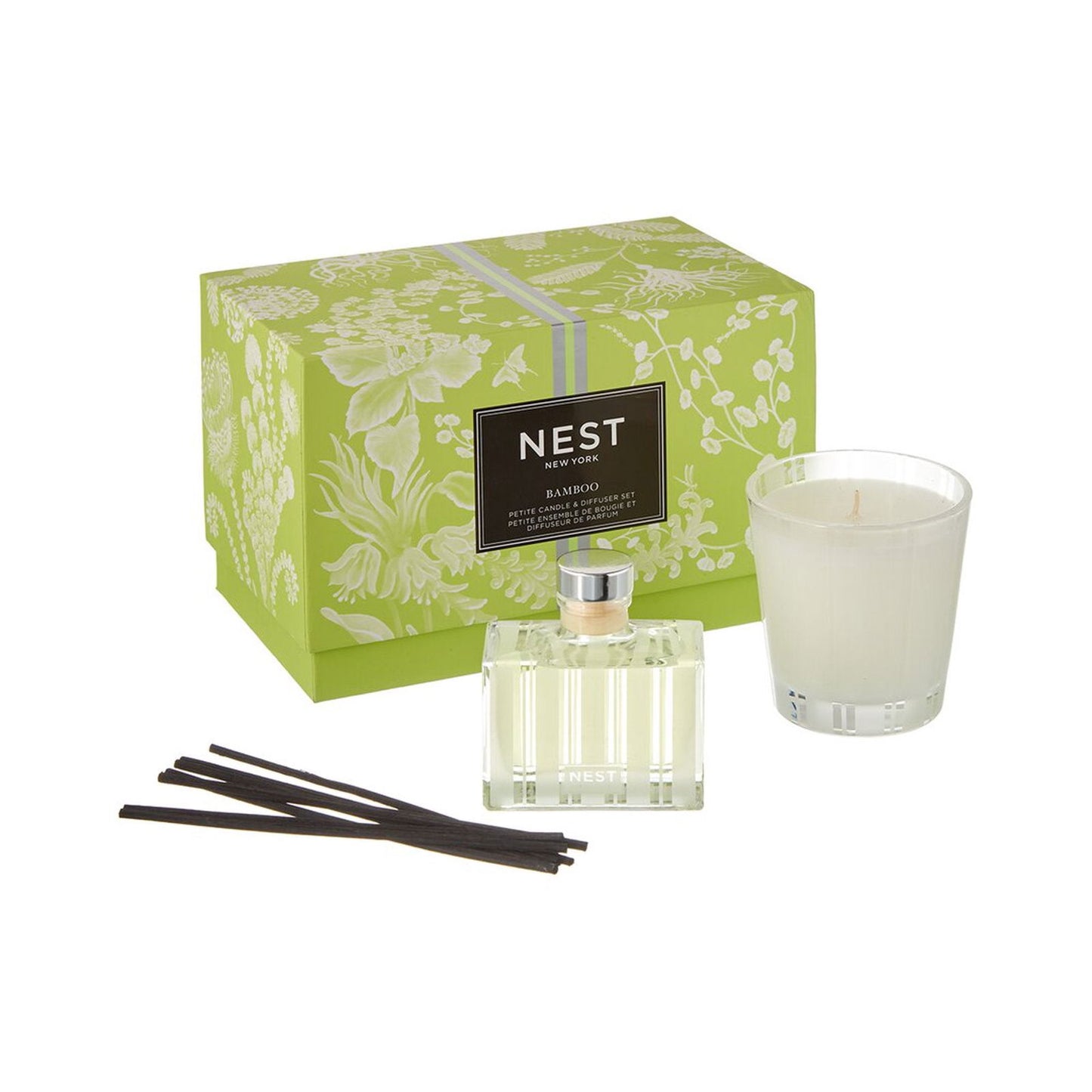 Photo of Bamboo Candle in a decorative scene, designed by , available at Plumb Gold & Plumb Silver