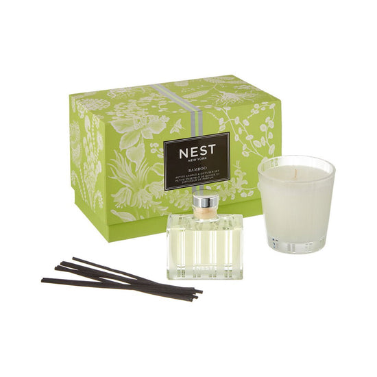 Photo of Bamboo Candle in a decorative scene, designed by , available at Plumb Gold & Plumb Silver