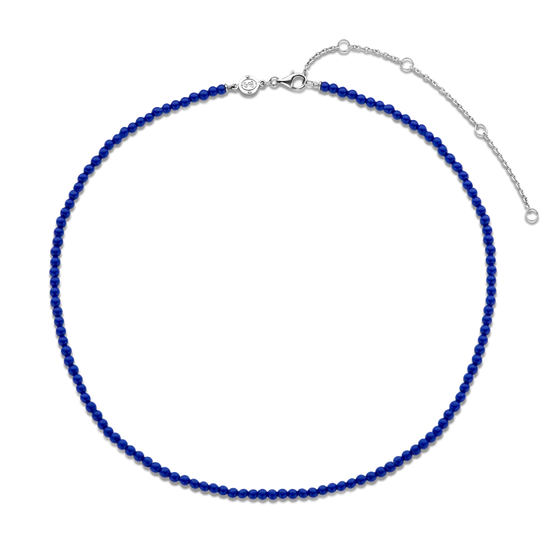 Photo of Beaded Lapis Necklace in a decorative scene, designed by , available at Plumb Gold & Plumb Silver