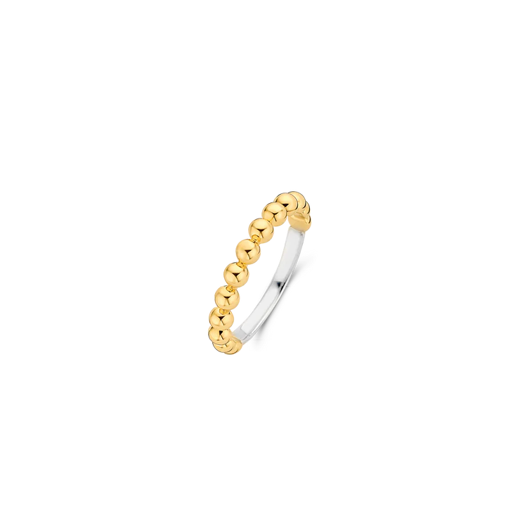 Photo of Beaded Ring in a decorative scene, designed by , available at Plumb Gold & Plumb Silver