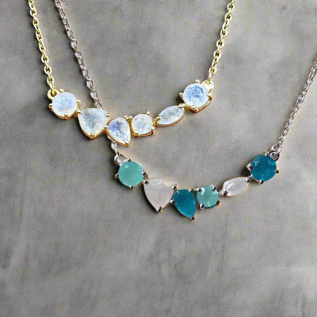 Photo of “Bella” Necklace in a decorative scene, designed by -, available at Plumb Gold & Plumb Silver