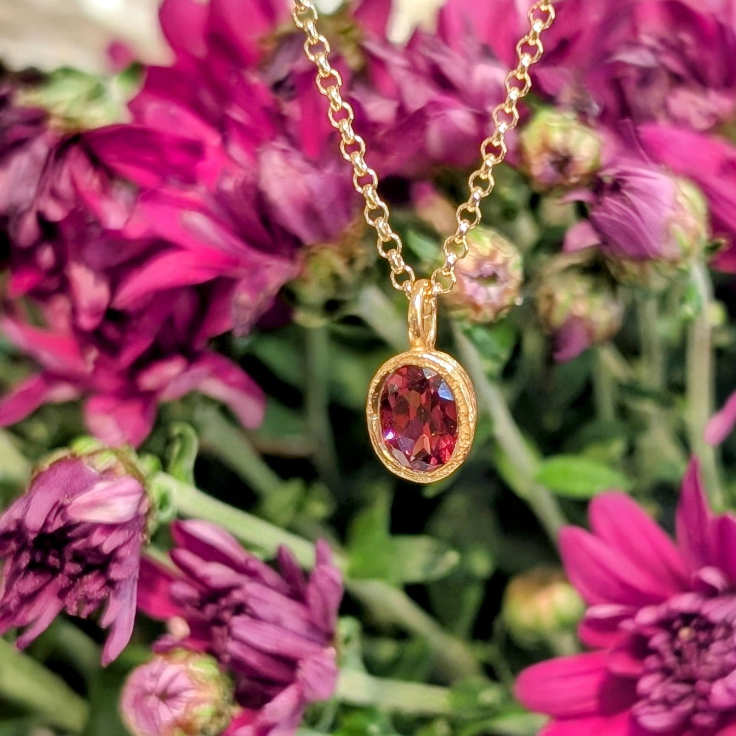Photo of Birthstone Pendants By Jorge in a decorative scene, designed by -, available at Plumb Gold & Plumb Silver