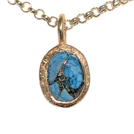 Photo of Birthstone Pendants By Jorge in a decorative scene, designed by -, available at Plumb Gold & Plumb Silver