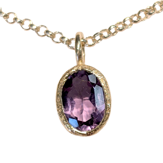 Photo of Birthstone Pendants By Jorge in a decorative scene, designed by -, available at Plumb Gold & Plumb Silver