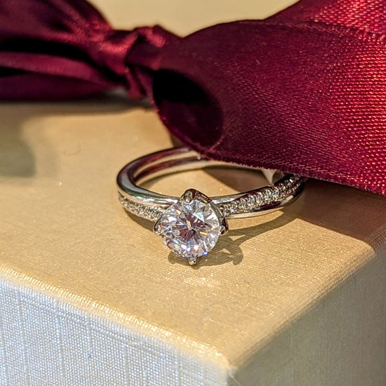 Photo of "Blanca" Engagement Ring in a decorative scene, designed by , available at Plumb Gold & Plumb Silver
