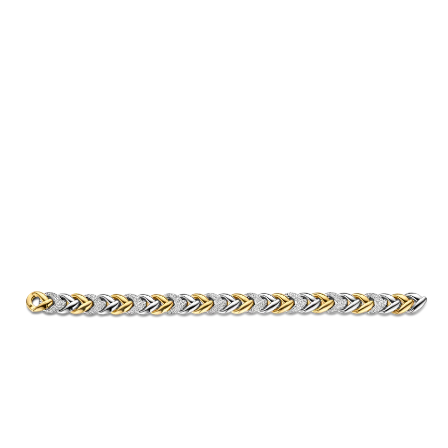 Photo of Braided Link Bracelet in a decorative scene, designed by , available at Plumb Gold & Plumb Silver