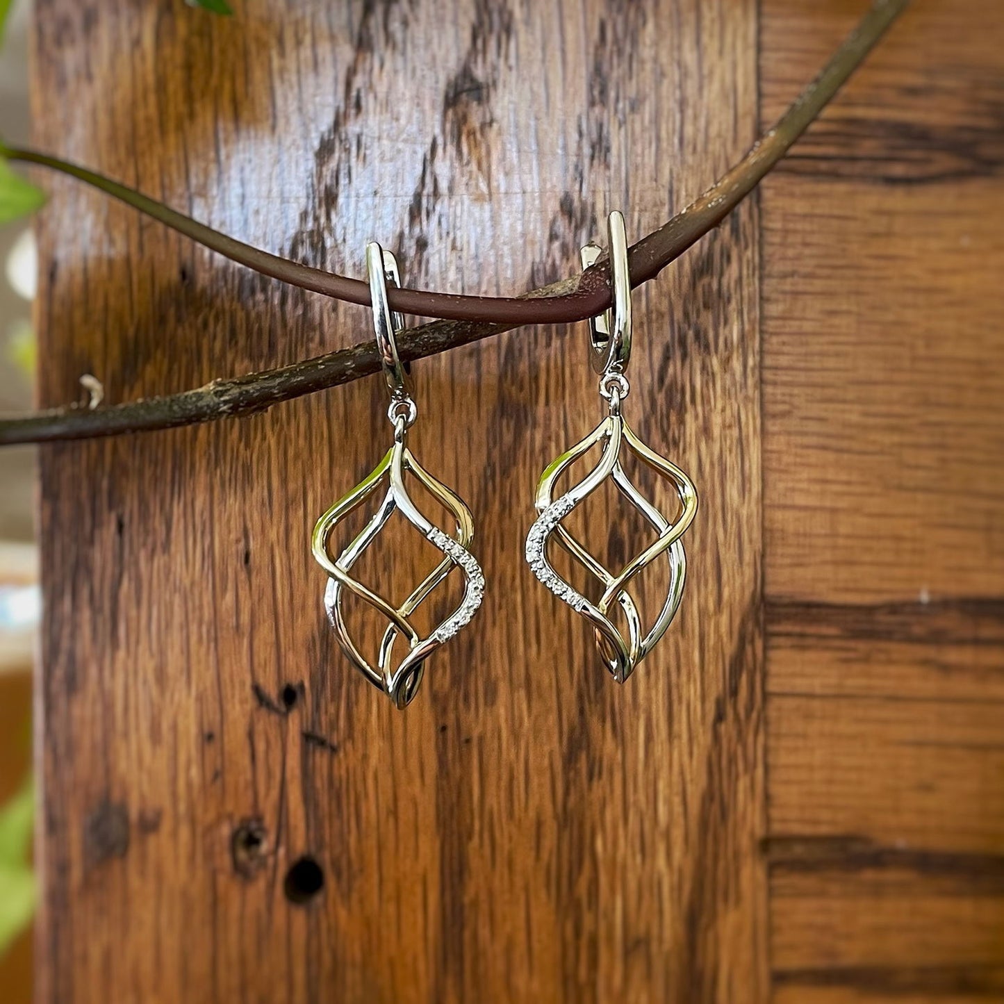 Photo of Breuning Diamond Freeform Dangles in a decorative scene, designed by , available at Plumb Gold & Plumb Silver