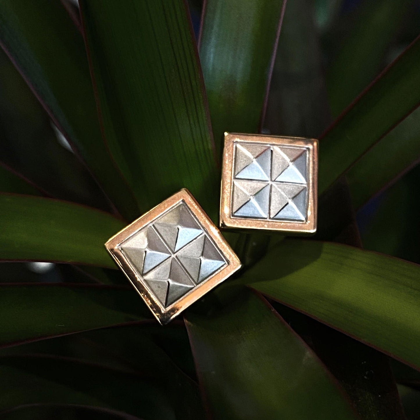 Photo of Breuning Two-Tone Stud Cufflinks in a decorative scene, designed by , available at Plumb Gold & Plumb Silver