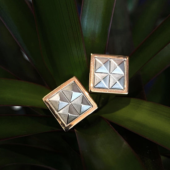 Photo of Breuning Two-Tone Stud Cufflinks in a decorative scene, designed by , available at Plumb Gold & Plumb Silver