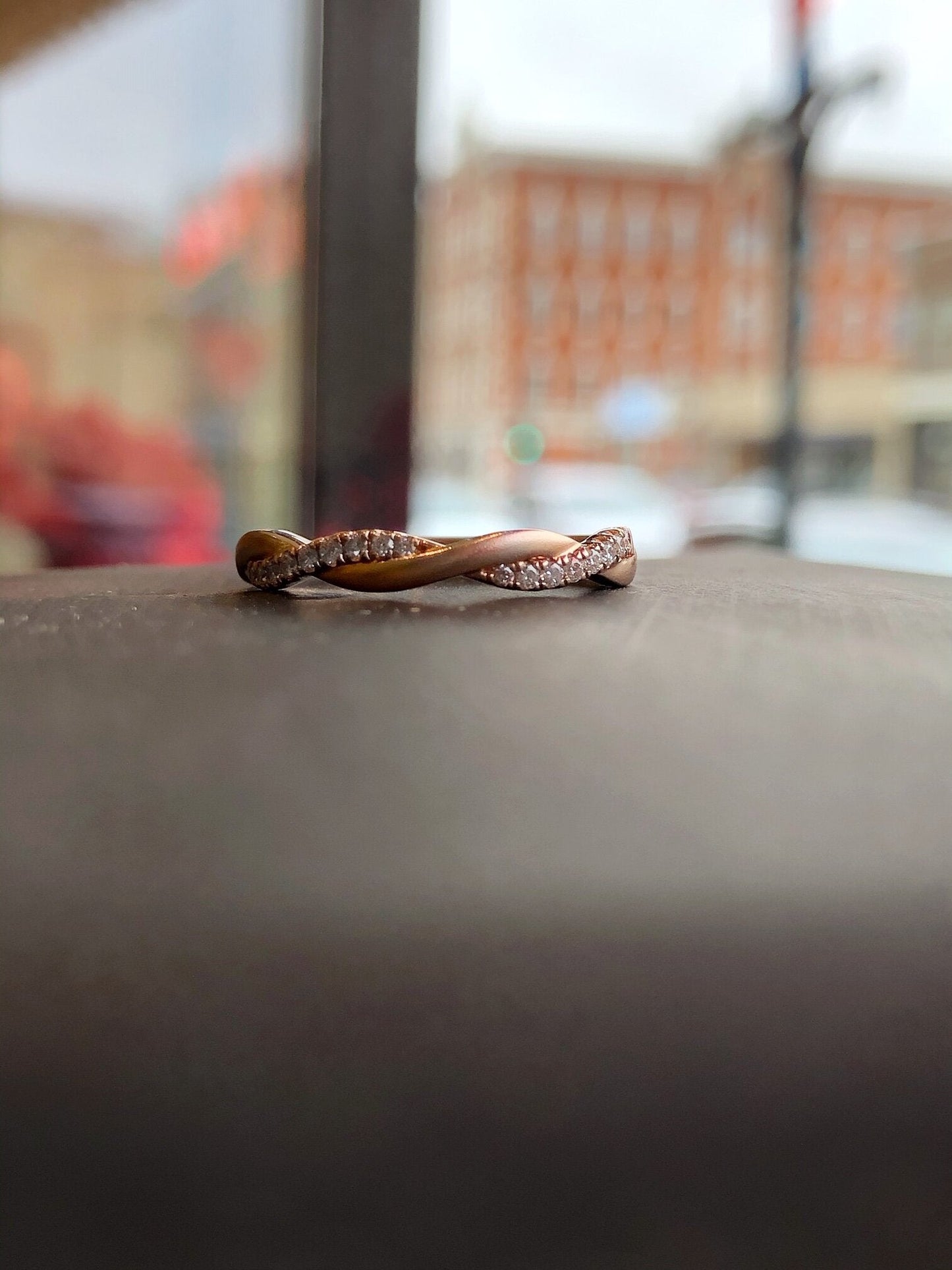 Photo of Brushed Twist Band in a decorative scene, designed by , available at Plumb Gold & Plumb Silver