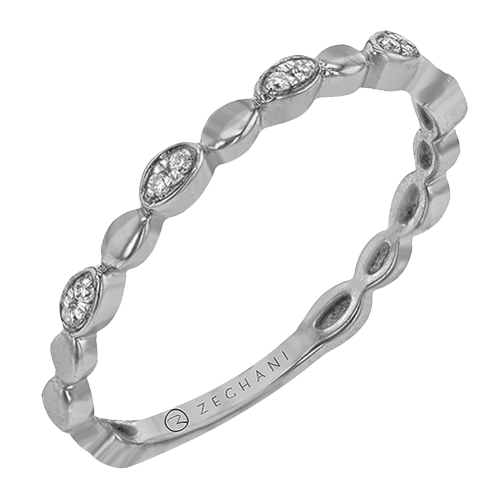 Photo of "Celeste" Marquise Band in a decorative scene, designed by , available at Plumb Gold & Plumb Silver