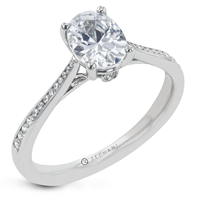Photo of "Cher" Diamond Semi-Mount Engagement Ring in a decorative scene, designed by , available at Plumb Gold & Plumb Silver