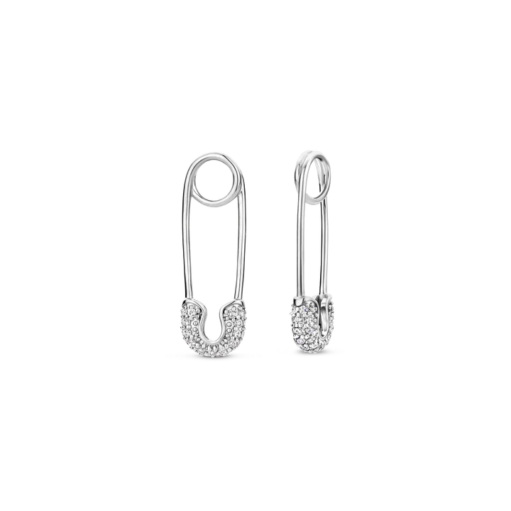 Photo of Chic pin charm in a decorative scene, designed by , available at Plumb Gold & Plumb Silver
