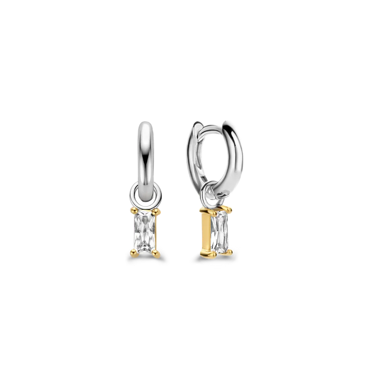 Photo of Cubic Zirconia Baguette Dangle Earrings in a decorative scene, designed by , available at Plumb Gold & Plumb Silver