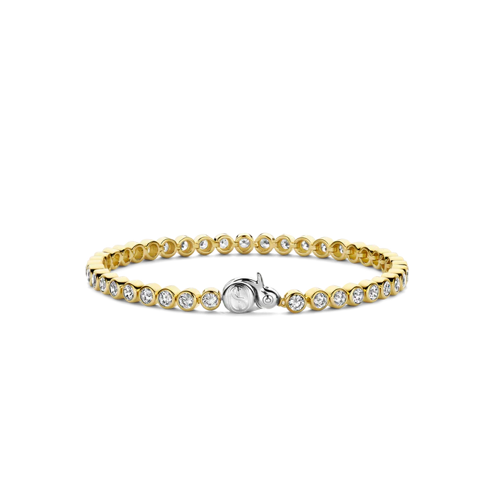 Photo of Cubic Zirconia Bezel Tennis Bracelet in a decorative scene, designed by , available at Plumb Gold & Plumb Silver