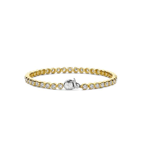 Photo of Cubic Zirconia Bezel Tennis Bracelet in a decorative scene, designed by , available at Plumb Gold & Plumb Silver