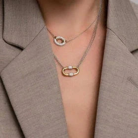 Photo of Cubic Zirconia Oval Necklace in a decorative scene, designed by , available at Plumb Gold & Plumb Silver