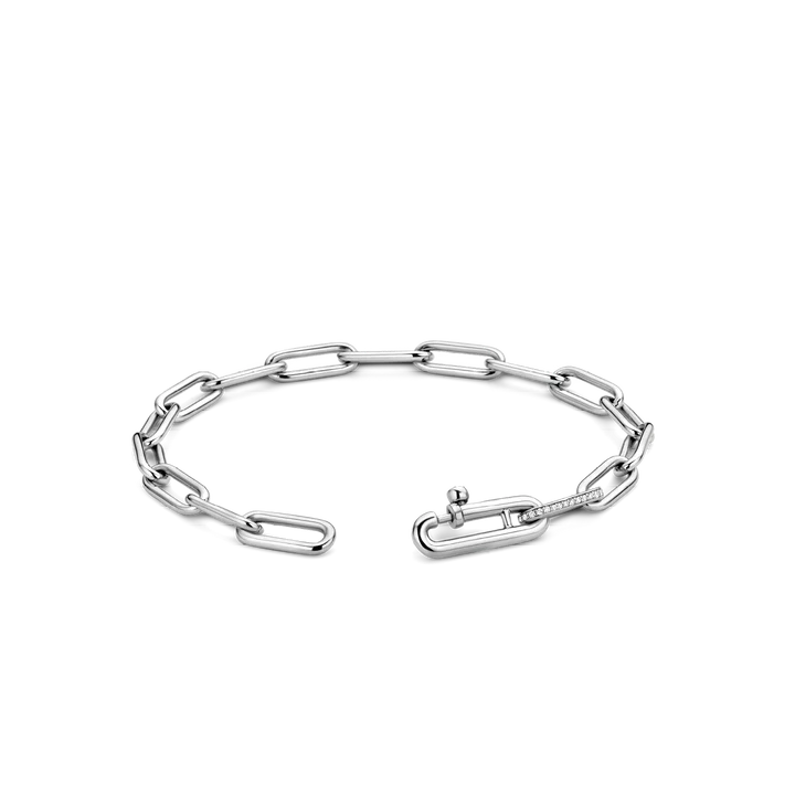 Photo of Cubic Zirconia Paperclip Link Bracelet in a decorative scene, designed by , available at Plumb Gold & Plumb Silver