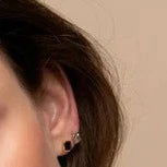 Photo of Cubic Zirconia Studs in a decorative scene, designed by , available at Plumb Gold & Plumb Silver