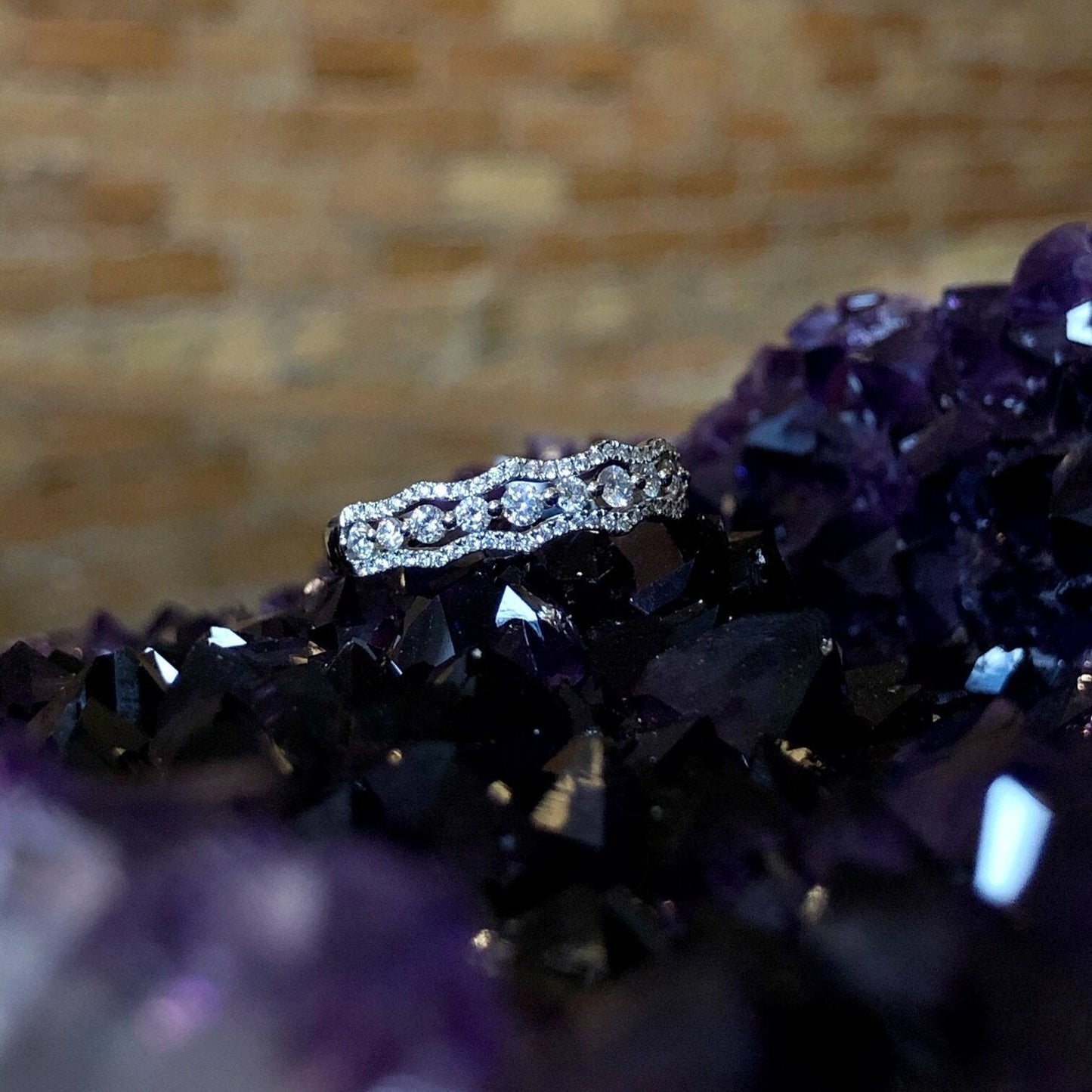 Photo of Diamond Anniversary Band in a decorative scene, designed by , available at Plumb Gold & Plumb Silver
