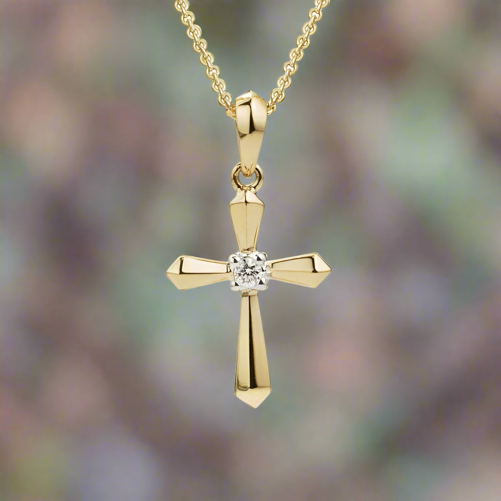 Photo of Diamond Cross Necklace in a decorative scene, designed by , available at Plumb Gold & Plumb Silver