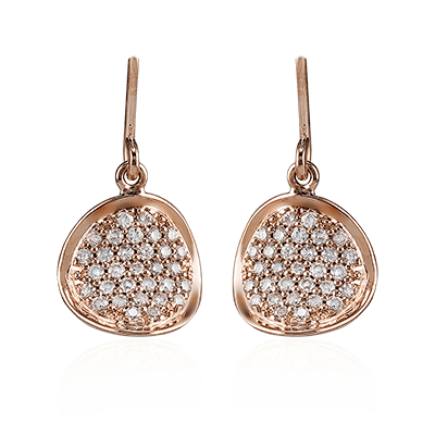 Photo of Diamond Disk Dangles in a decorative scene, designed by , available at Plumb Gold & Plumb Silver