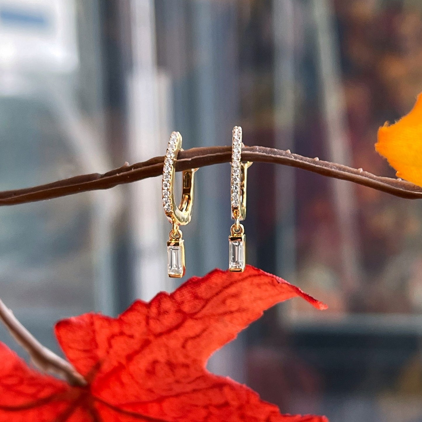 Photo of Diamond Earrings in a decorative scene, designed by , available at Plumb Gold & Plumb Silver