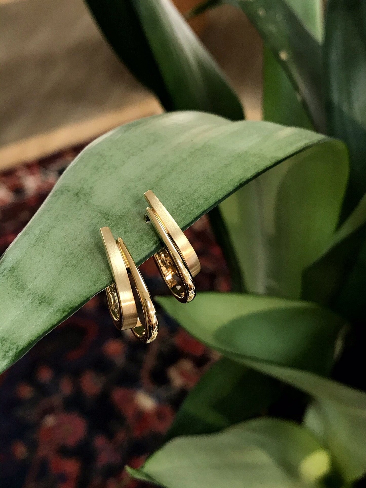 Photo of Double Hoops in a decorative scene, designed by , available at Plumb Gold & Plumb Silver