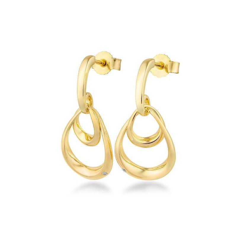 Photo of Double Oval Dangle Earrings in a decorative scene, designed by , available at Plumb Gold & Plumb Silver