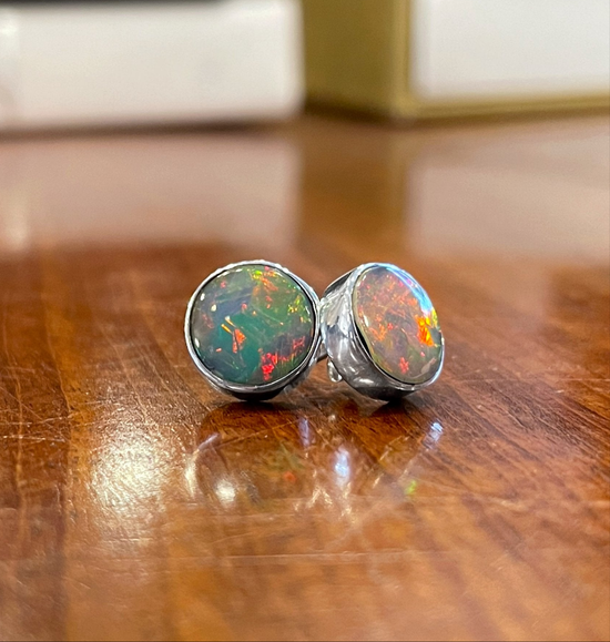 Photo of Dowdy Opal Stud Earrings in a decorative scene, designed by , available at Plumb Gold & Plumb Silver