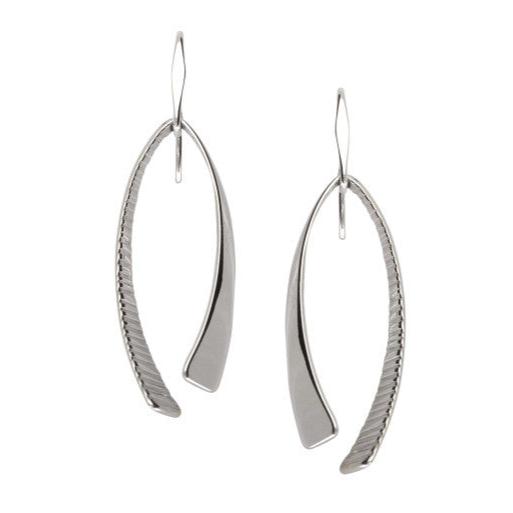Photo of "Duet" Earrings in a decorative scene, designed by , available at Plumb Gold & Plumb Silver