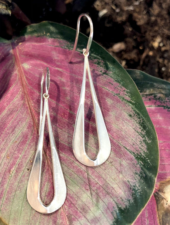 Photo of EL Designs "Zeal" Earrings Drop Earrings in a decorative scene, designed by , available at Plumb Gold & Plumb Silver