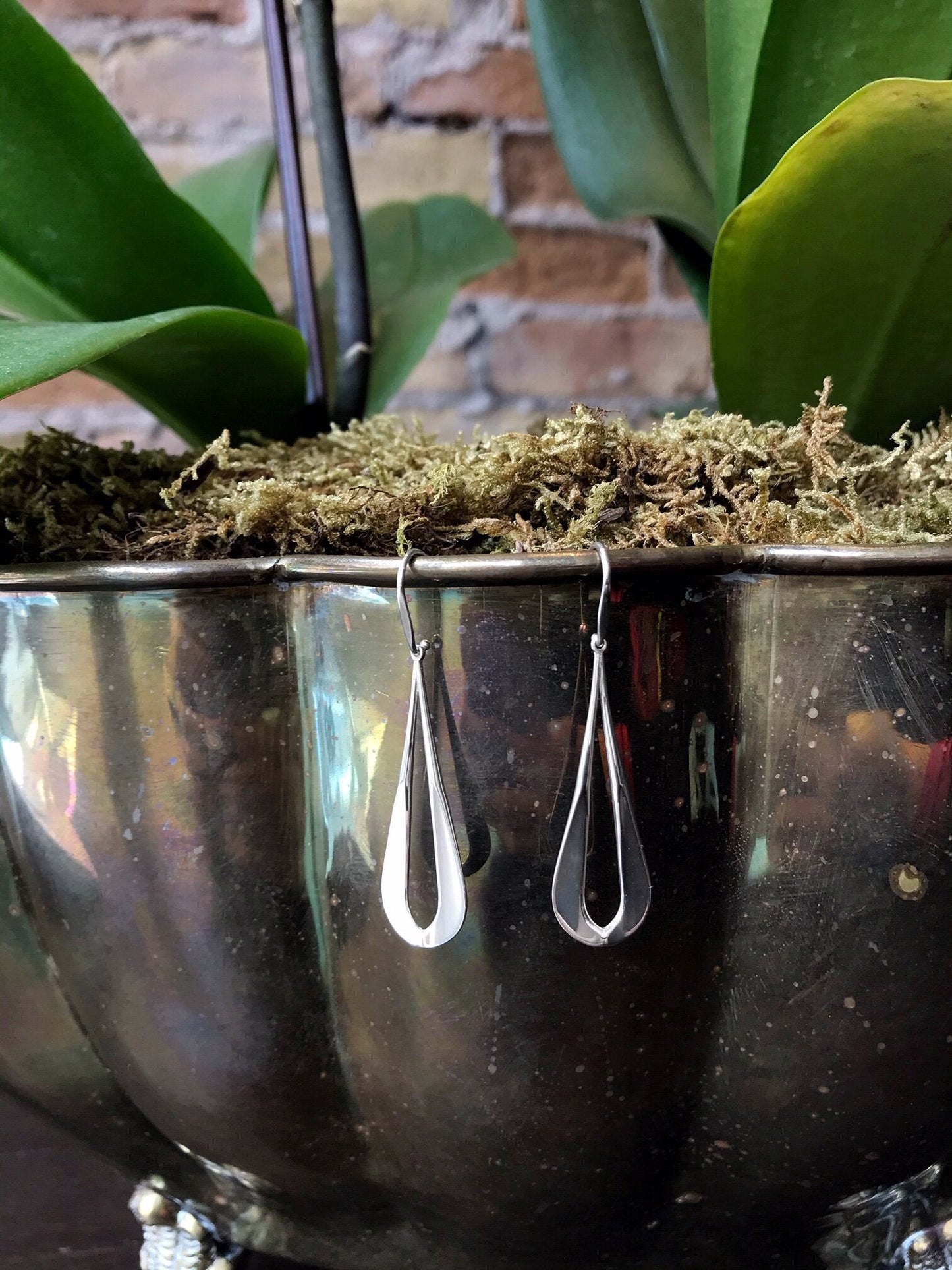 Photo of EL Designs "Zeal" Earrings Drop Earrings in a decorative scene, designed by , available at Plumb Gold & Plumb Silver
