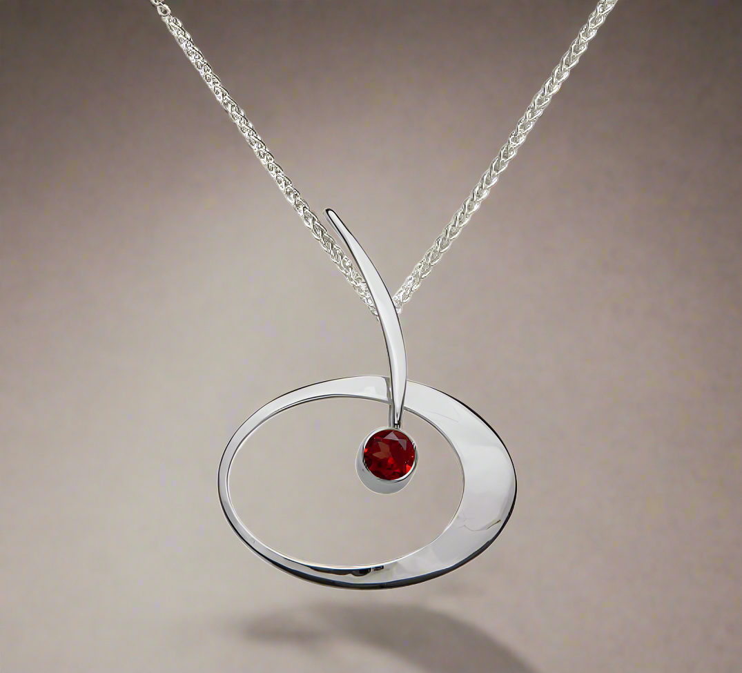 Photo of "Elliptical Elegance" Necklace in a decorative scene, designed by , available at Plumb Gold & Plumb Silver
