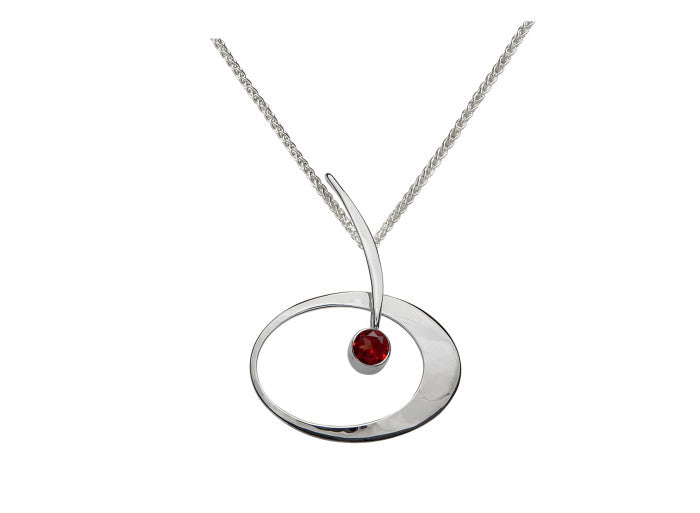 Photo of "Elliptical Elegance" Necklace in a decorative scene, designed by , available at Plumb Gold & Plumb Silver