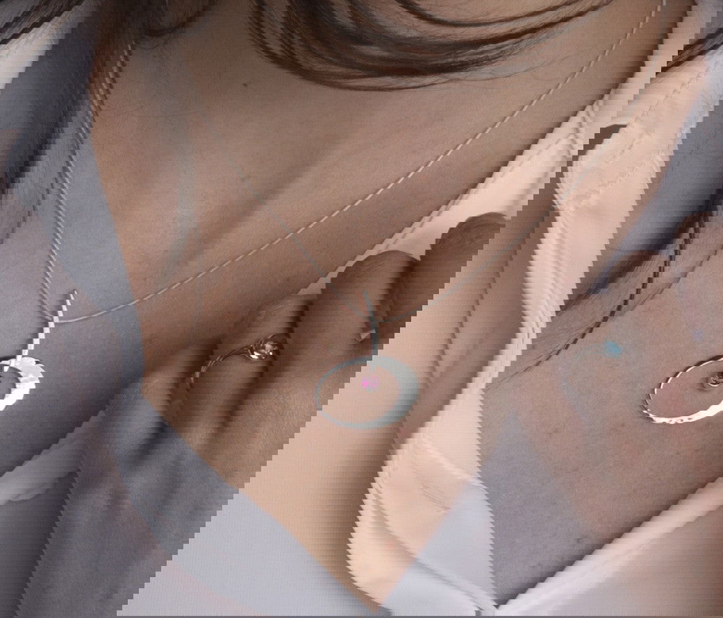 Photo of "Elliptical Elegance" Necklace in a decorative scene, designed by , available at Plumb Gold & Plumb Silver