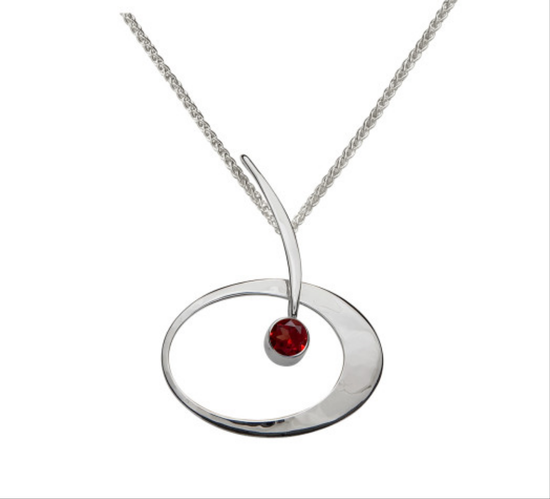 Photo of "Elliptical Elegance" Necklace in a decorative scene, designed by , available at Plumb Gold & Plumb Silver