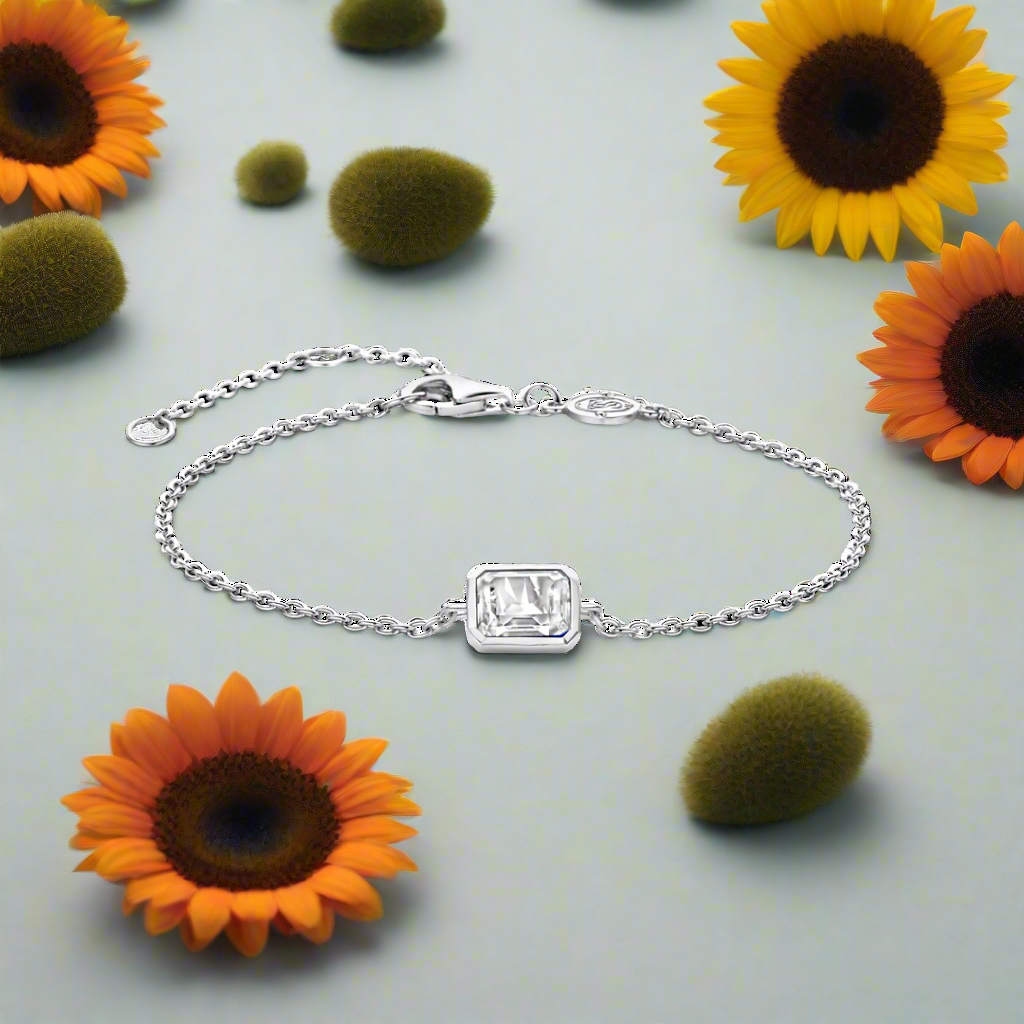 Photo of Emerald Cut Cubic Zirconia Bracelet in a decorative scene, designed by , available at Plumb Gold & Plumb Silver