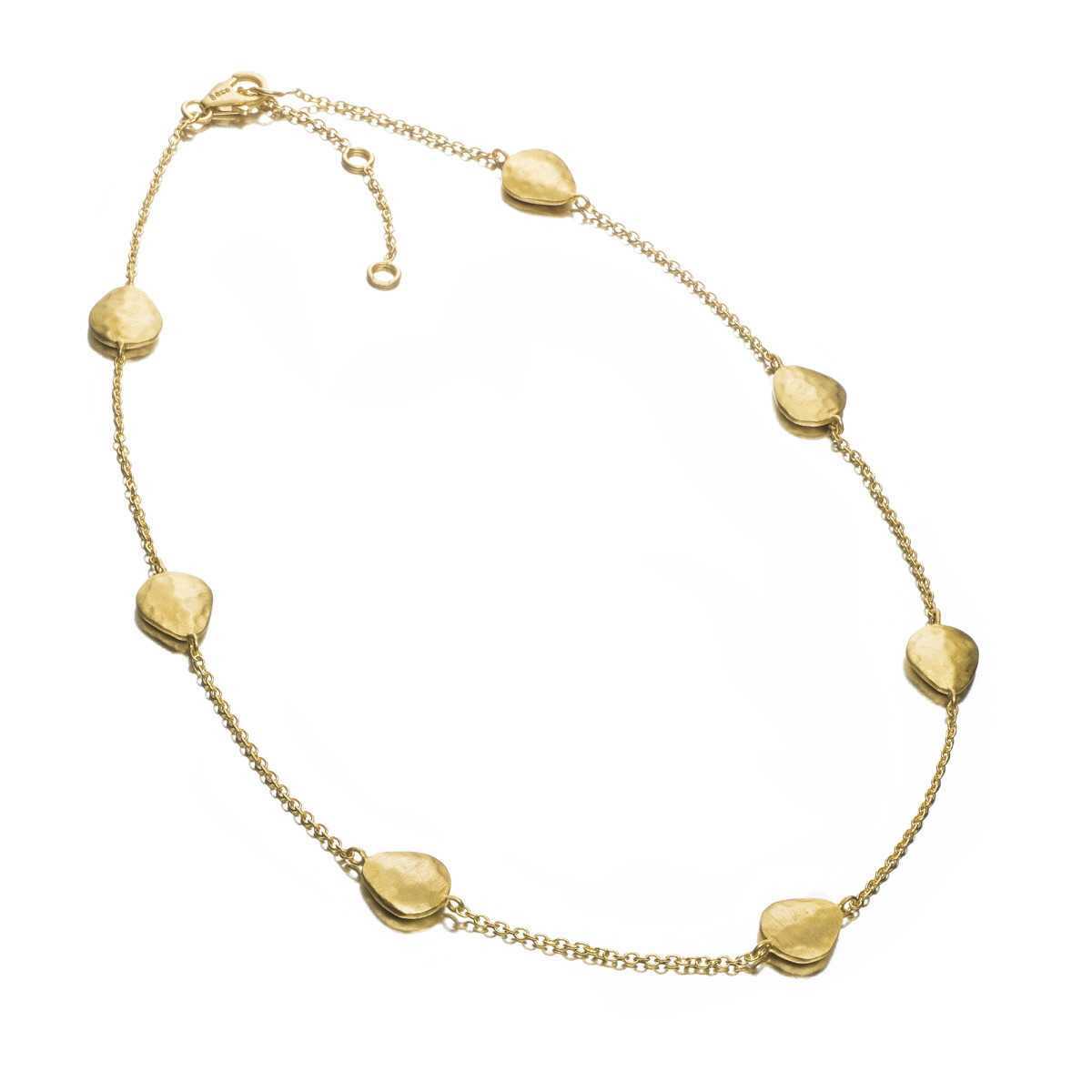 Photo of "Essential" Necklace in a decorative scene, designed by -, available at Plumb Gold & Plumb Silver