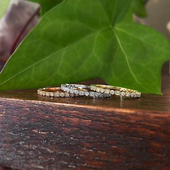 Photo of "Etta" Geometric Diamond Band in a decorative scene, designed by , available at Plumb Gold & Plumb Silver