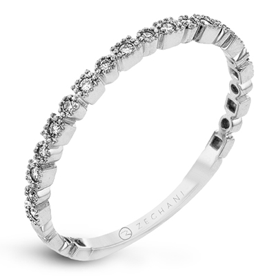 Photo of "Etta" Geometric Diamond Band in a decorative scene, designed by , available at Plumb Gold & Plumb Silver