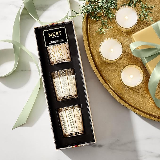 Photo of Festive Votive Candle Trio in a decorative scene, designed by , available at Plumb Gold & Plumb Silver