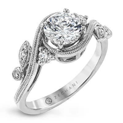 Photo of "Flora" Botanical Swirl Engagement Ring in a decorative scene, designed by , available at Plumb Gold & Plumb Silver
