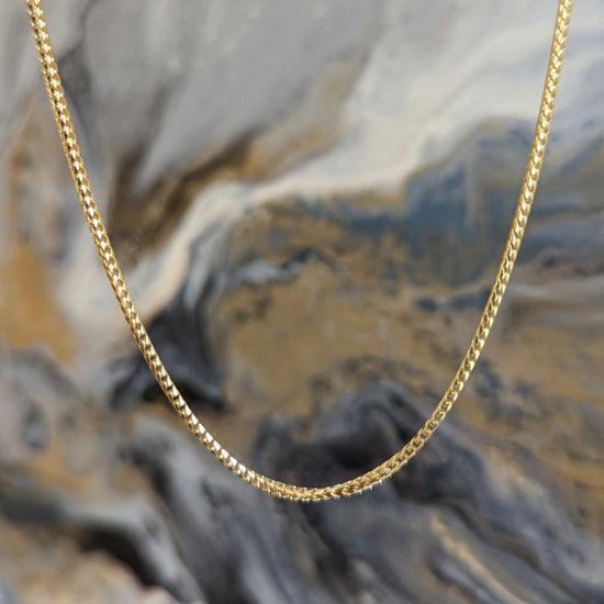 Photo of Franco link Chain in a decorative scene, designed by , available at Plumb Gold & Plumb Silver