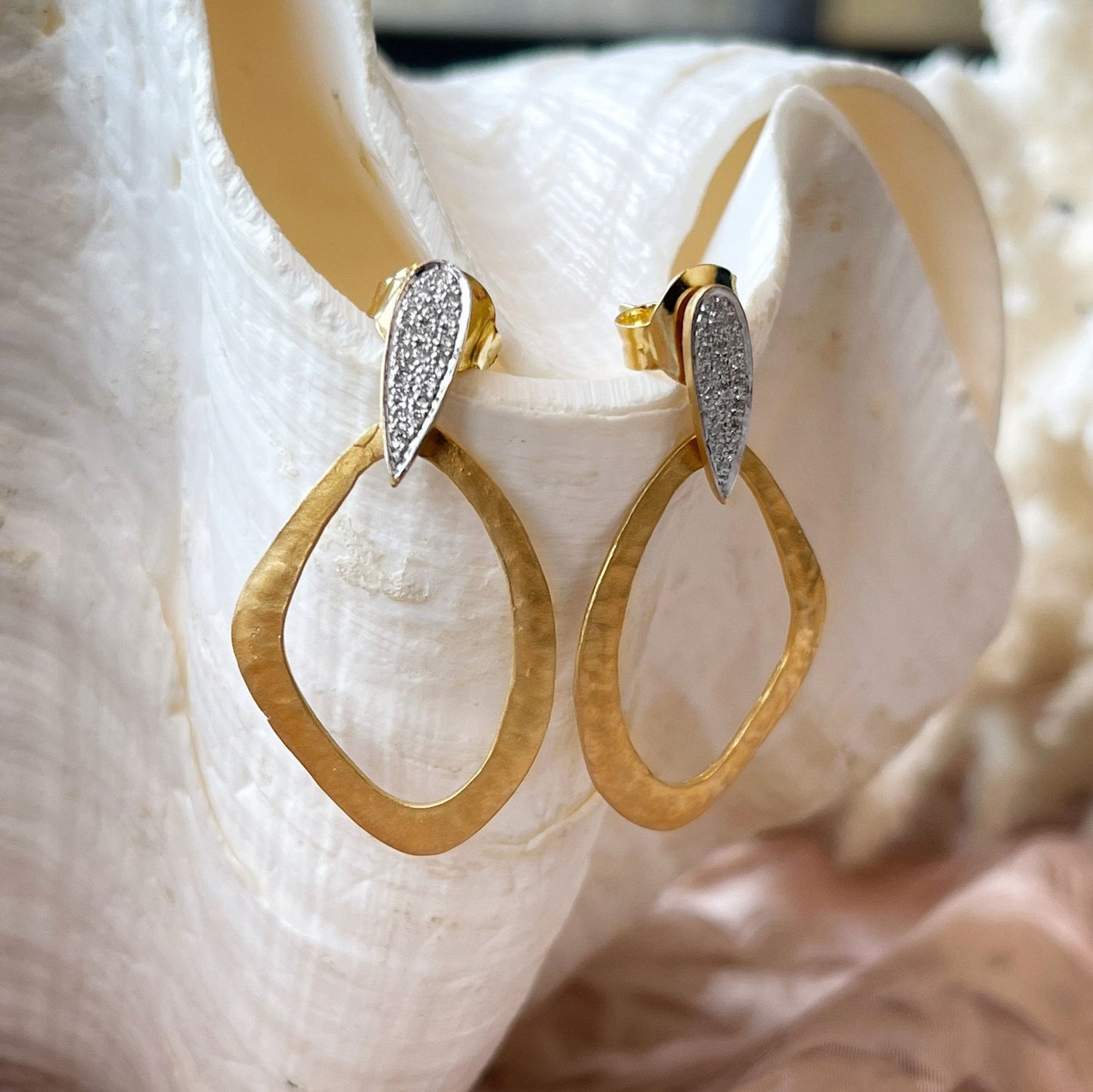 Photo of Gallery Dangles in a decorative scene, designed by , available at Plumb Gold & Plumb Silver