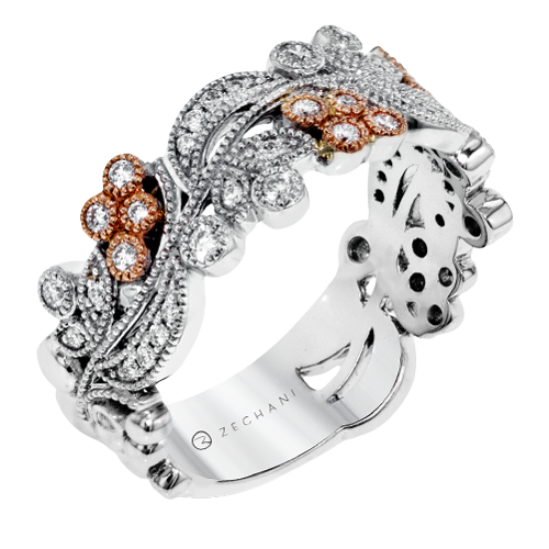 Photo of "Gardenia" Rose Gold Accent Band in a decorative scene, designed by , available at Plumb Gold & Plumb Silver
